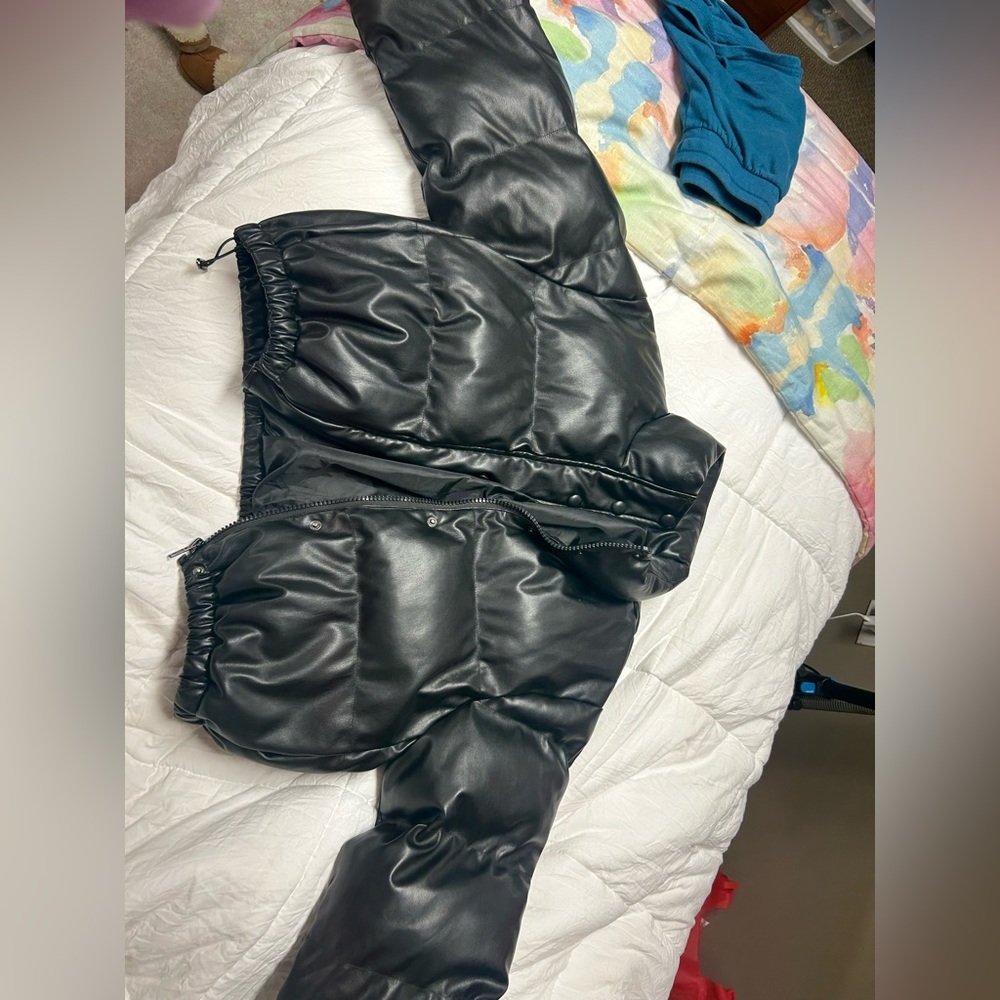 Selling this black leather puffer jacket because I never wear it